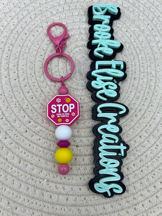 Pink stop sign keychain